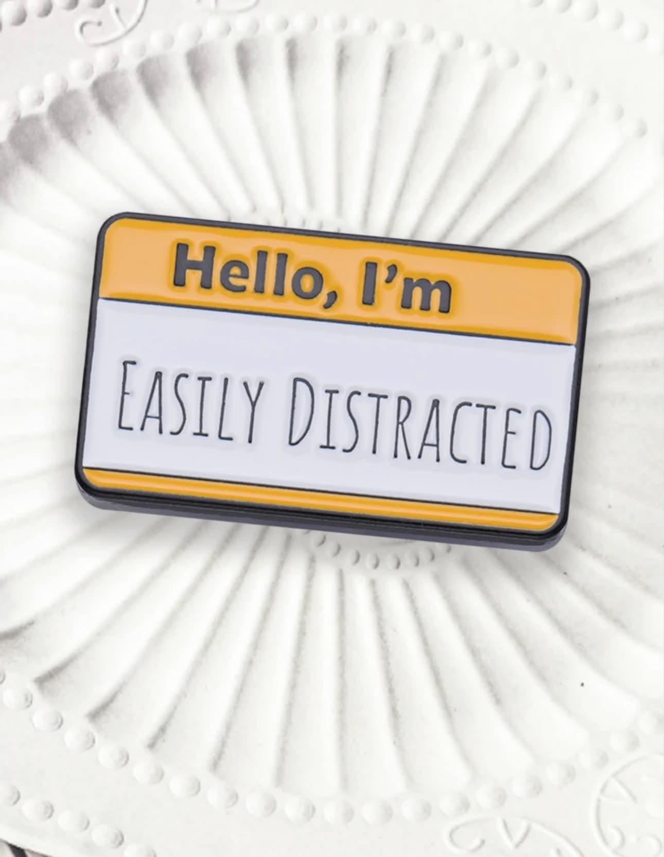 ''Hello, I'm easily distracted'' Enamel Badge