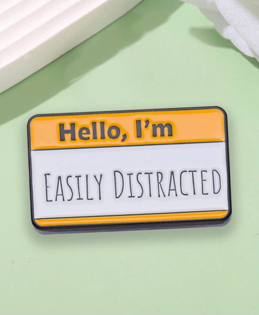 ''Hello, I'm easily distracted'' Enamel Badge
