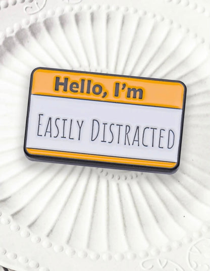 ''Hello, I'm easily distracted'' Enamel Badge