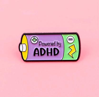 ''Powered by ADHD'' Enamel Badge